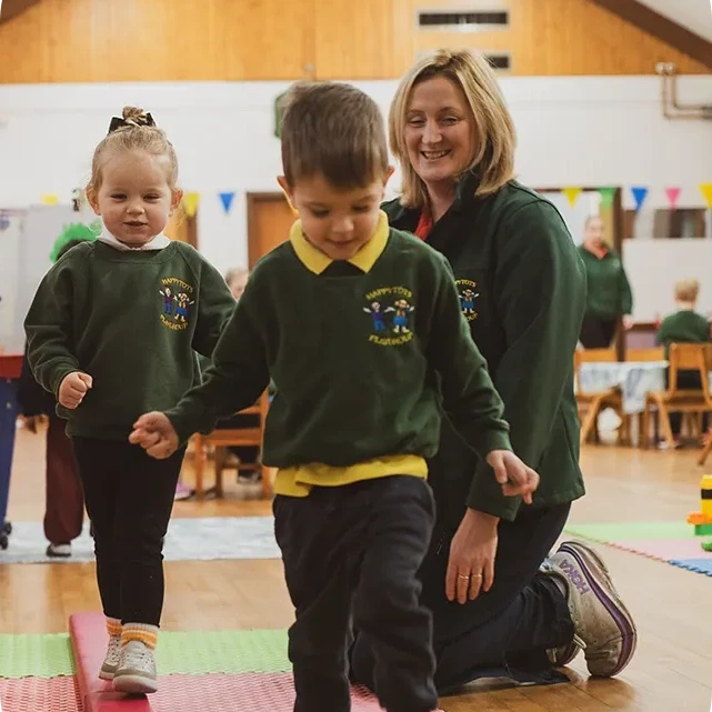 happy tots playground kids try out on the balance beam as 2nd generation owner zoe watches on
