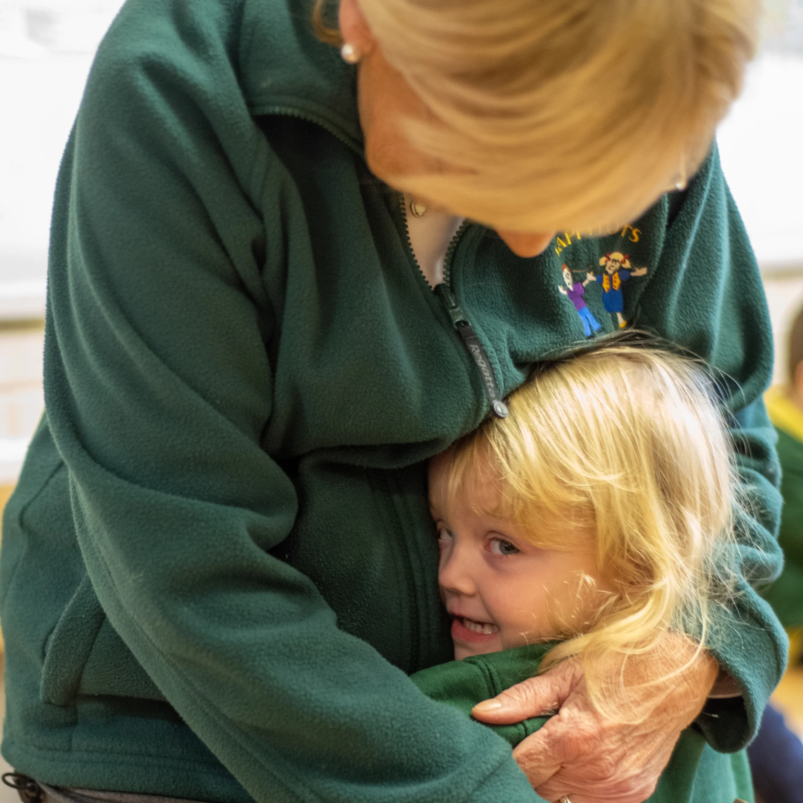 experienced staff staff member getting a hug